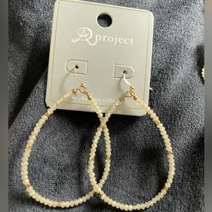 Silver and gold earrings